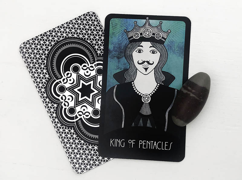 Ý nghĩa khi lá King of Pentacles xuôi